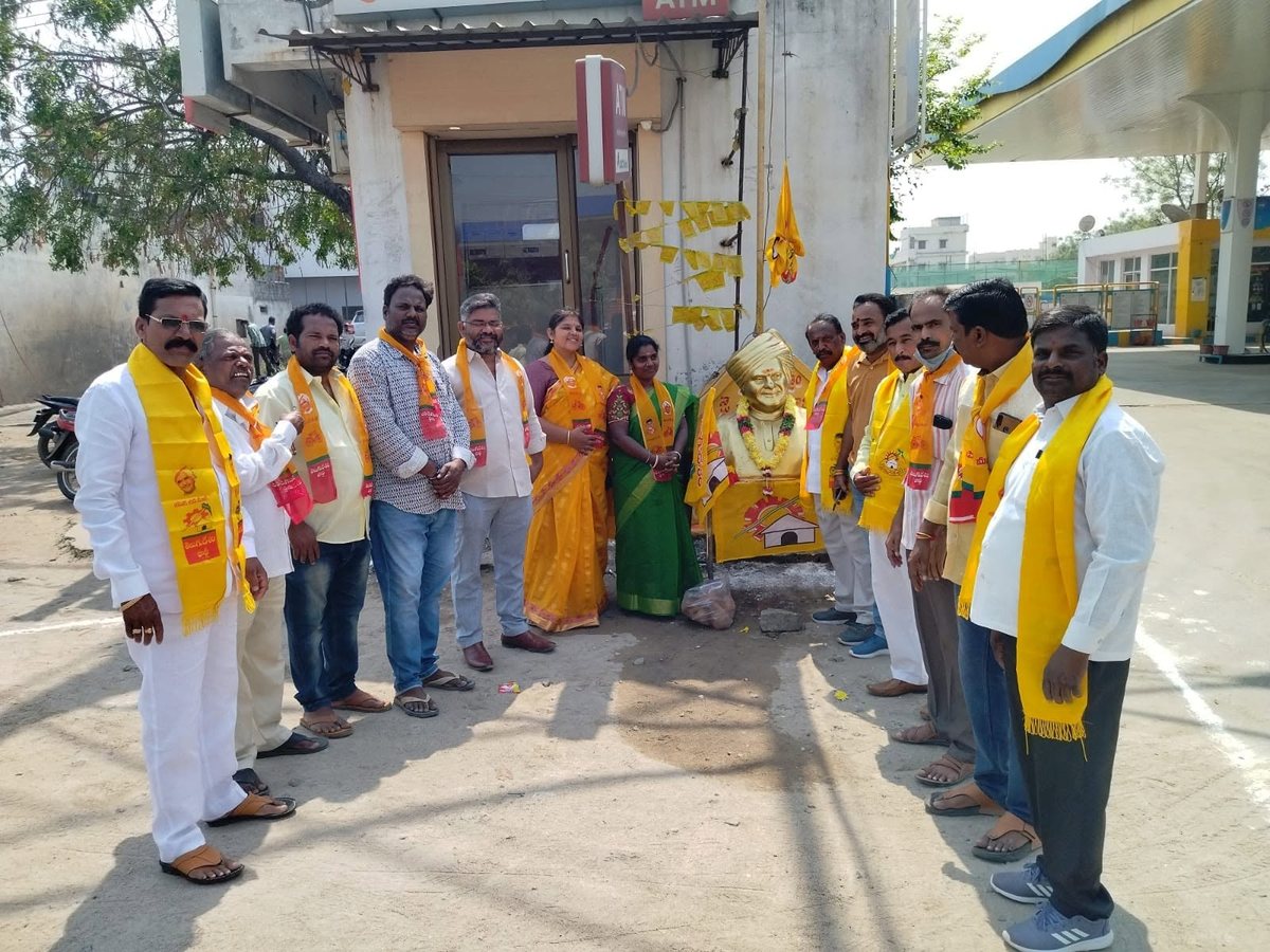 Telugu Desam Party workers paying tribute at an N.T. Rama Rao statue